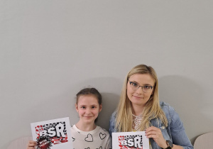 uczennica klasy 5 c wraz z nauczycielem